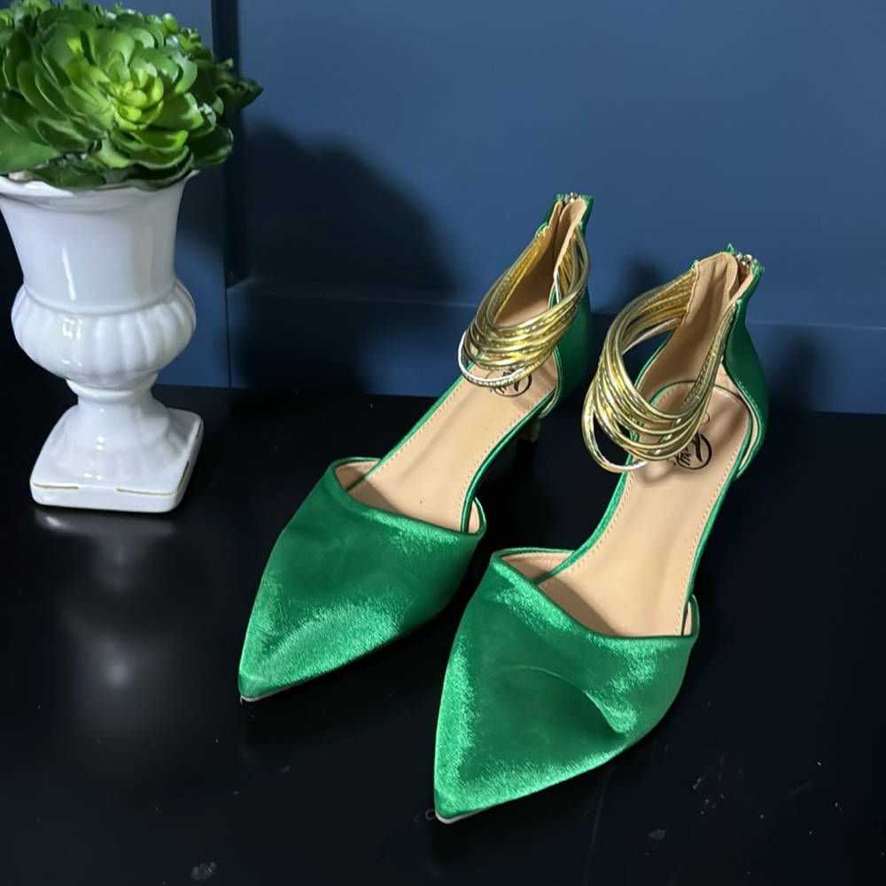 Women's size 9 green heel gold strap. Zip back. Perfect condition